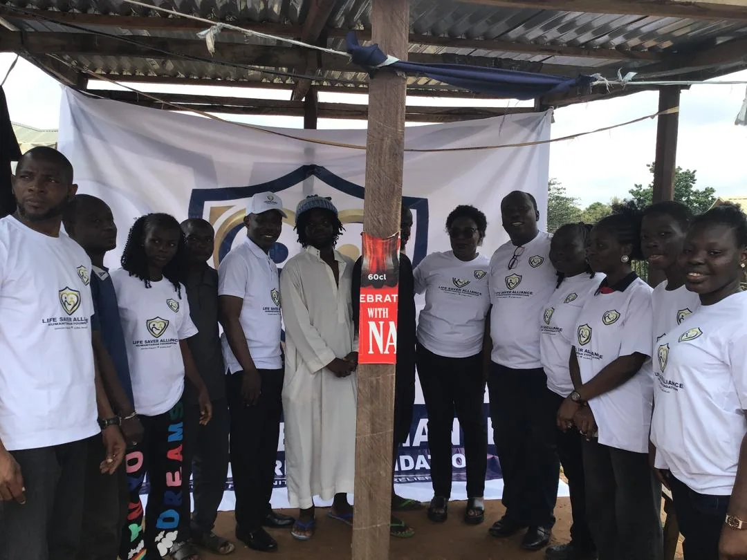LAHF volunteers and community representatives gather for a group portrait