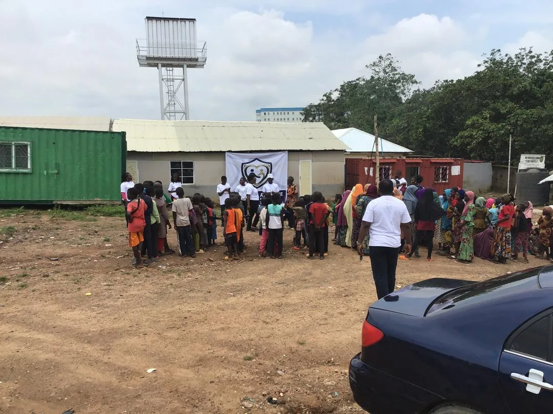 A wide view of children and families gathering for the LAHF outreach in Durumi 1